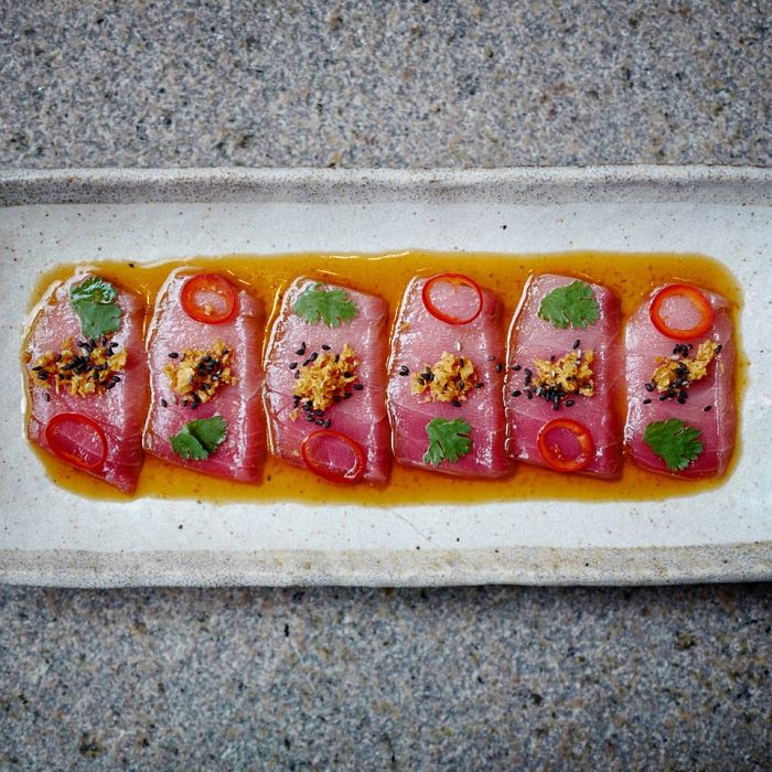 Thinly Sliced Semi-Fatty Tuna with Chilli, Coriander and Sesame.